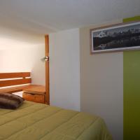 La chambre en mezzanine